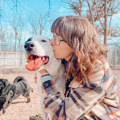 Dog cuddles during enrichment activities